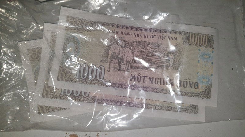 Nhận 3.000 đồng tiền hỗ trợ thiệt hại do bão, người phụ nữ cất kỹ trong tủ để kỷ niệm